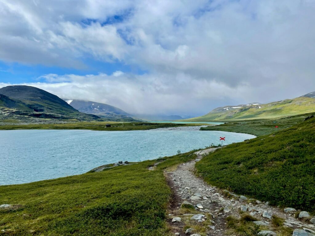 Trail passing a lake on the Kungsleden in Swedish lapland
